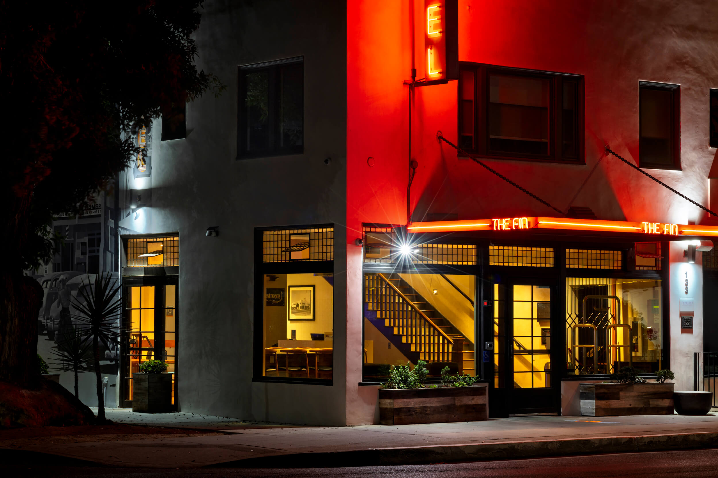 <h4>The Fin
</h4>
<p class="carousel-desc">Red neon transforms a restaurant into a scene of invitation and absence.
</p>
<a href="#" class="slidelink">View Print Details</a>